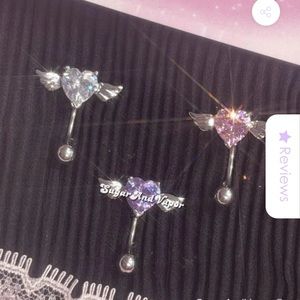 sugar and vapor belly rings piercing
